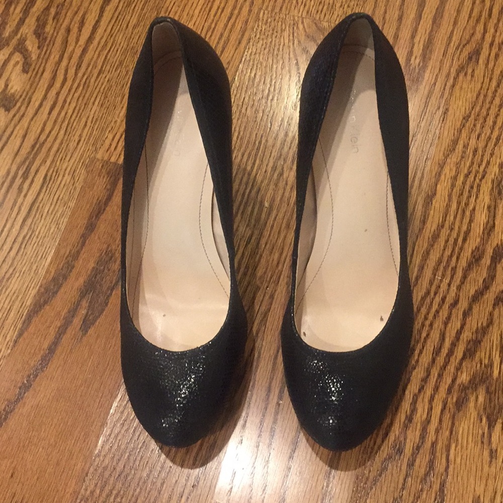 Calvin Klein black platform pumps